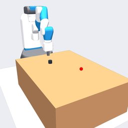 Fetch robot arm manipulating a block on a table